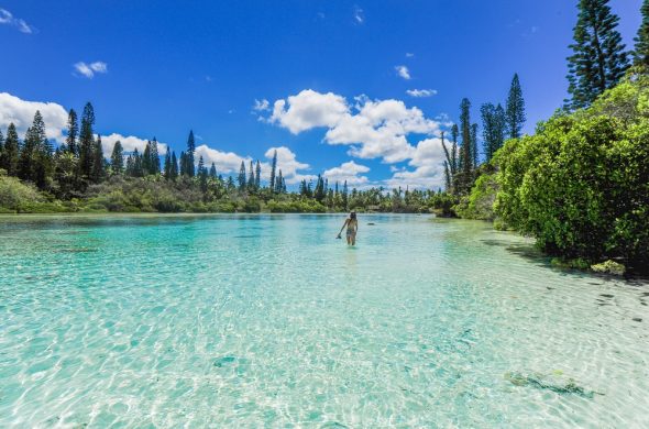 A girl standing in the lake New Caledonia
