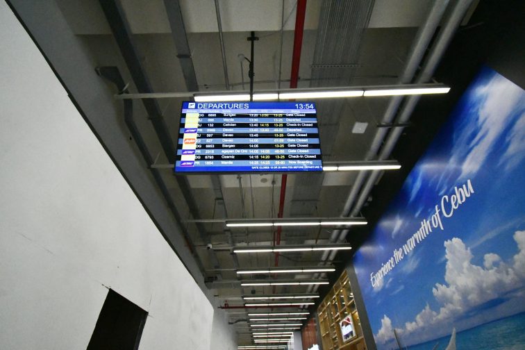 walking to departure in cebu airport3