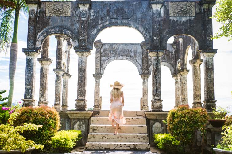 Beautiful girl at Water Palace in Bali