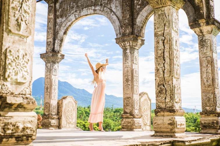 Beautiful girl at Water Palace in Bali