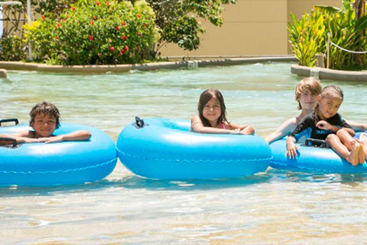 guam plaza pool children playing at the pool