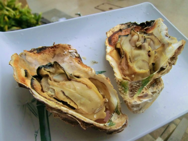 Grilled,Oysters,On,Itsukushima,Island,,Miyajima,,Hiroshima,,Japan